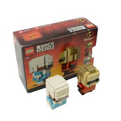 Six Lego Brick Headz built figures, comprising 40351 Ghost, 40272 Witch and 40422 Frankenstein, 41613 Mr Incredible & Frozone, 41593 Captain Jack Sparrow and 41594 Captain Armando Salazar, 