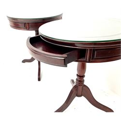 Pair Chinese rosewood drum tables, two drawers, turned column on fluted shaped supports 