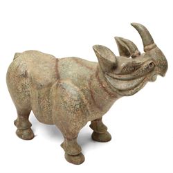 Carved stone Rhino, W44cm and a pair of two green stone Elephants, W38cm (3)