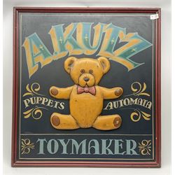 A Kutz Toymaker sign with central low re