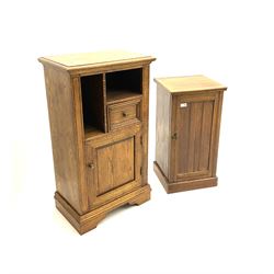 Narrow oak cabinet fitted with compartments, single short drawer and panelled cupboard door, bracket supports, (W52cm, D32cm, H91cm), together with Edwardian walnut bedside cabinet, panelled door enclosing shelving, (W36cm, D34cm, H70cm)