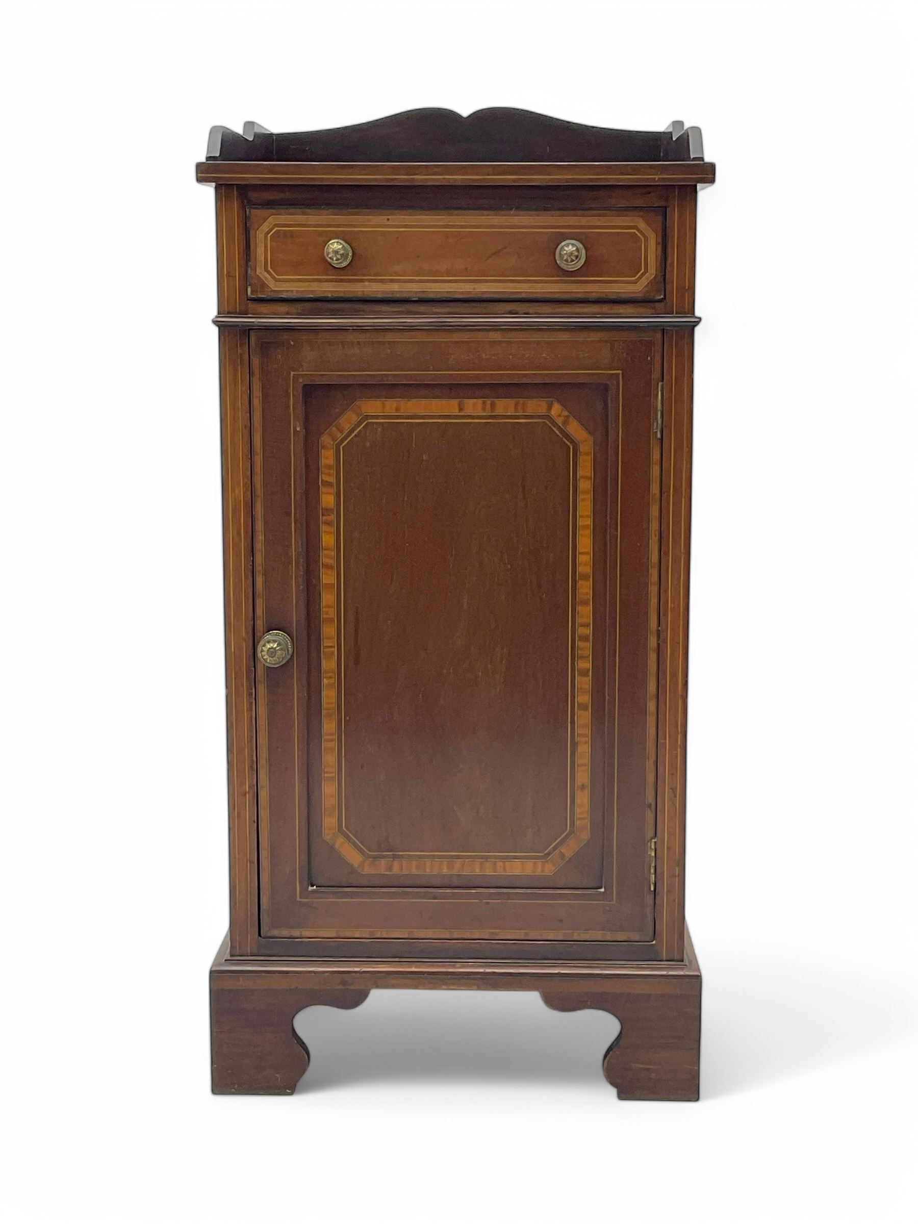 Edwardian mahogany inlaid bedside cabinet, inlaid top with gallery above, single drawer with button handles and single shelf cupboard, on scroll carved bracket feet
