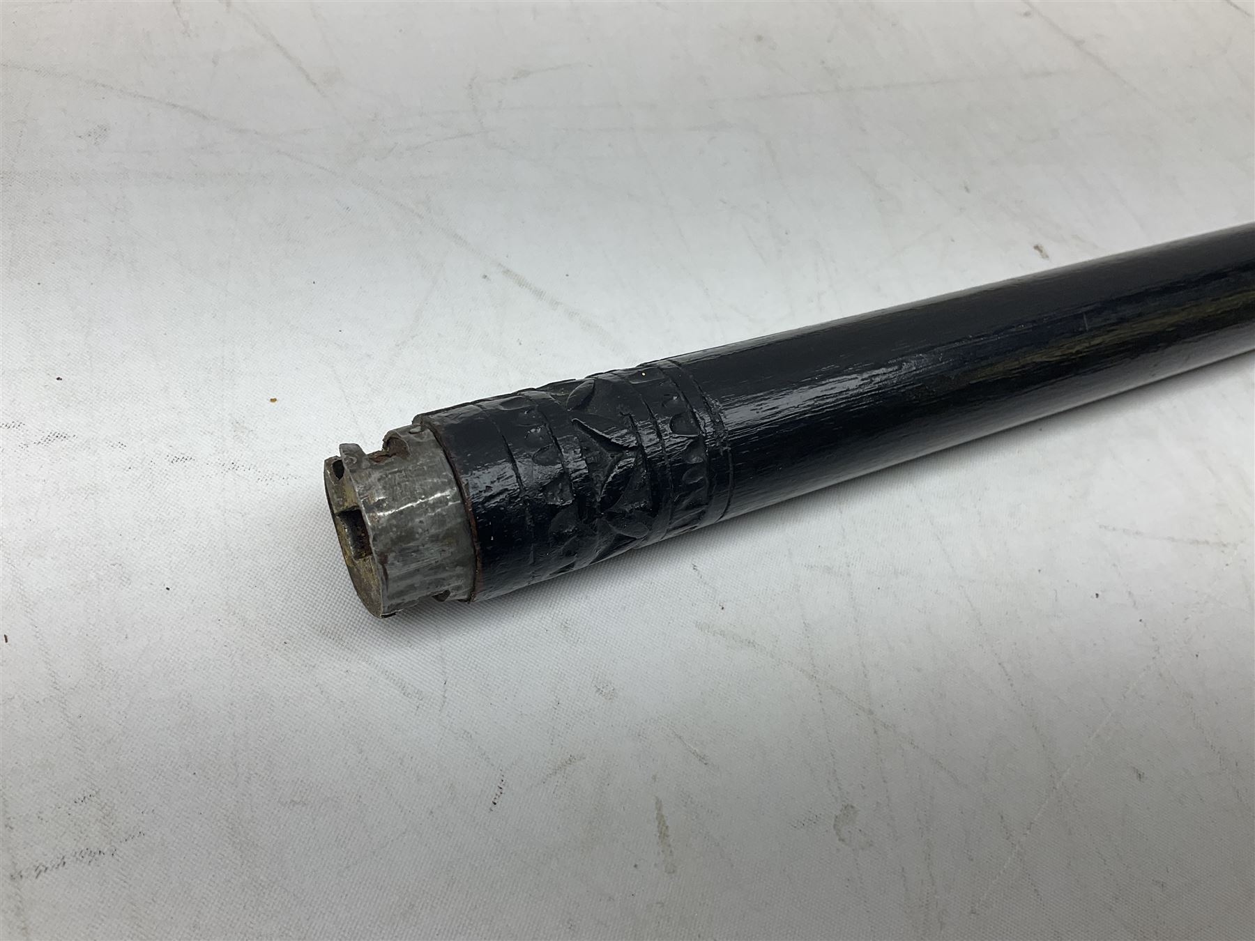 Late 19th/early 20th century Anglo Indian ebony and bone sword stick with 62cm steel blade, brass locking ferrule and lion mask pommel L92 cm.