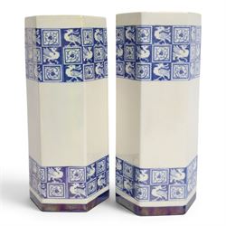 Pair of 1920's Art Deco Royal Doulton lustreware hexagonal vases, with boards of checkerboard design of alternating bird and scroll motifs, designed by Reco Capey, H28cm