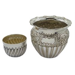 Edwardian silver bowl embossed half reeded and foliate decoration by Jay, Richard Attenborough & Co Chester 1901 and a small bowl by Robert Humphries, London, approx 6.65oz