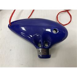 Four ocarinas three 10 hole ocarinas and one 16 hole double ocarina, three of which being from the Legend of Zelda franchise 