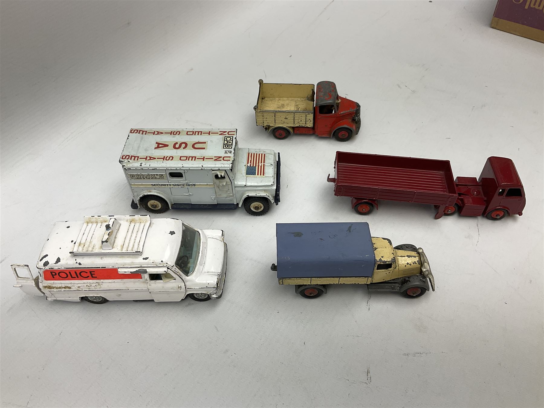 Dinky - twelve unboxed and playworn/repainted die-cast commercial vehicles including Hindle Smart Helecs, two Bedford tipper trucks, Dodge tipper truck, two Commer breakdown trucks, Brinks Armoured Car, Bedford Refuse wagon etc (12)