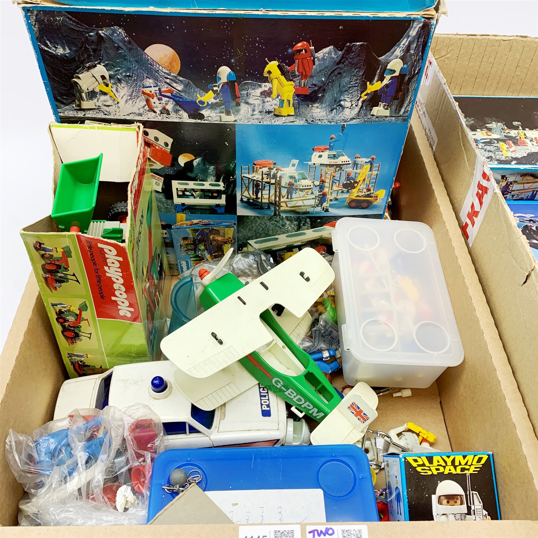 Playmobil - Playmo Space Station, boxed, and Shuttle, unboxed; Farm Tractor in part box; Police Car and various figures and accessories, predominantly unboxed.