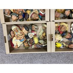 Large collection of Bossons plaster wall-masks, including including fisher man, cowboys, native Americans, etc, in four boxes 