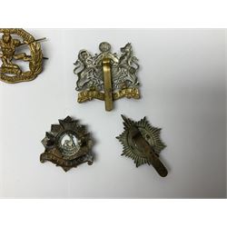 Seventeen regimental cap badges including Dorsetshire, Worcestershire, Staffordshire, Lancashire, Manchester, Middlesex, Berkshire, Bedfordshire etc (17)