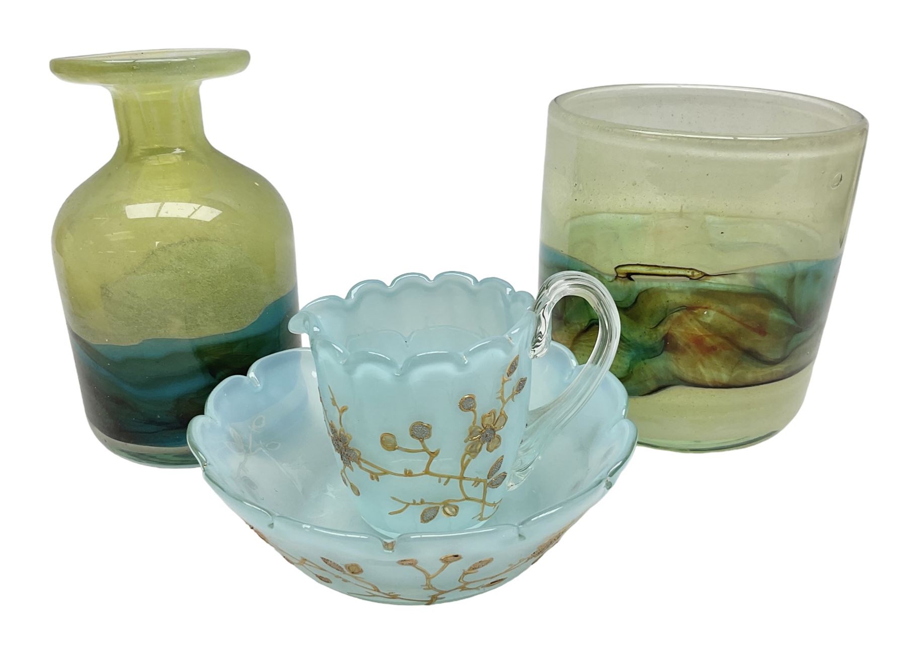 Mdina sea and sand glass vase, of cylindrical form, decorated in green, turquoise and brown, and matching vase, both unmarked together with a glass bowl and jug with gilt decoration 