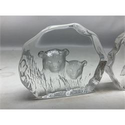 Two Mats Jonasson, Sweden paperweights, comprising polar bear in ice cave no 3152 and lion cubs, both with etched marks beneath, tallest H11.5cm