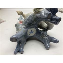 Four Lladro figures, comprising Touch of Class no 5377, Boy Student no 4517, Ocean Beauty no 5785 and Carnival Couple no 4882, largest example H45cm