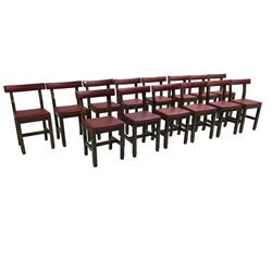 Set fifteen early 20th century oak school chairs, back rail and seat upholstered in claret red faux leather with studwork, raised on square supports united by H-stretcher (15)