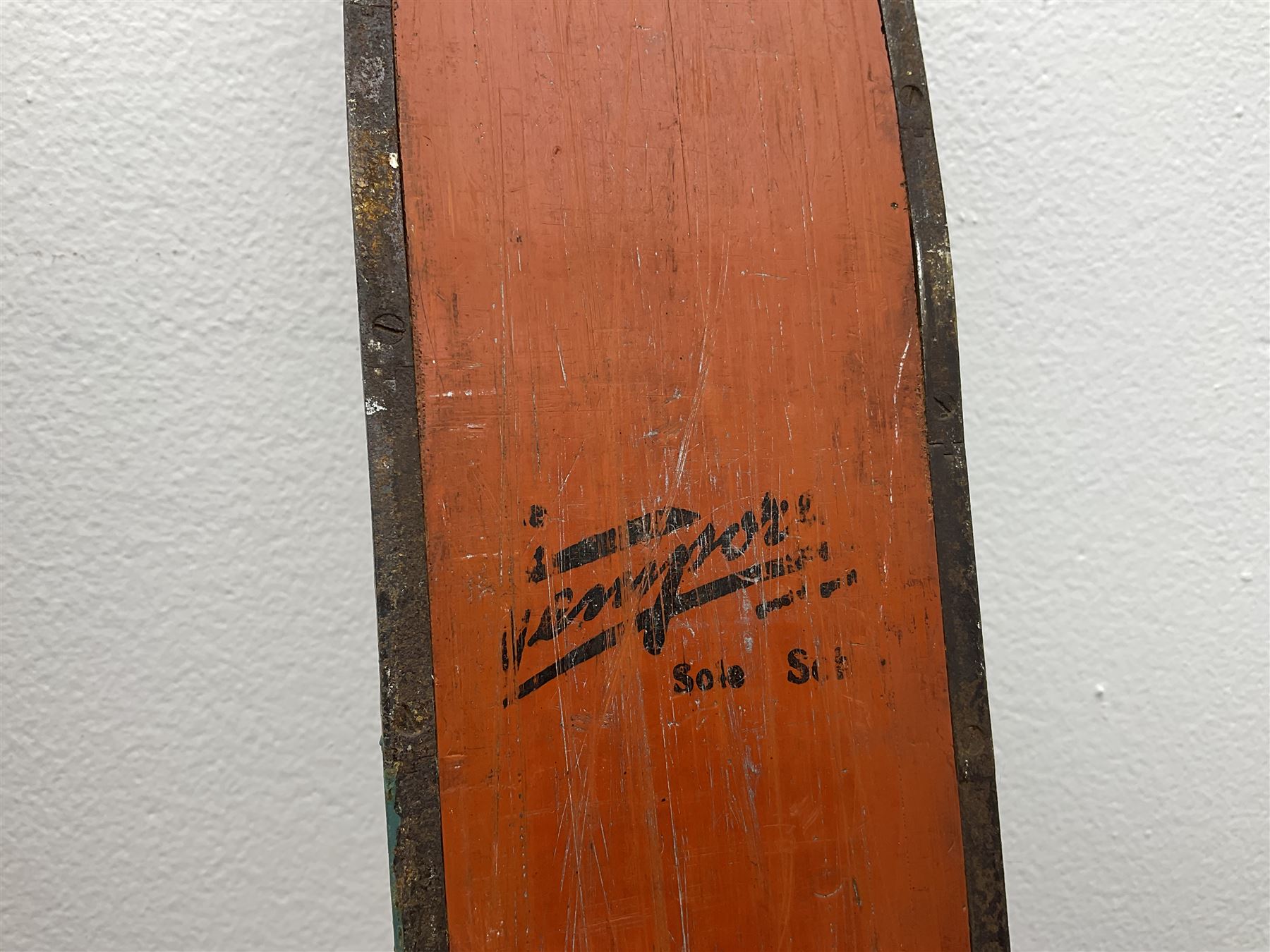 Pair of 1930s wooden skis, with painted metal runners beneath stamped Attenhofer, with retailers label for Ernst Gertsch Central Sports, L206cm