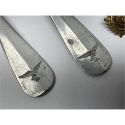 WW2 German Luftwaffe Mess cutlery comprising table spoon and fork, each with H.M.Z.38 mark; WW1 British War Medal awarded to L-13858 Gnr. J. McCabe R.A.; and small quantity of military badges, rank pips etc