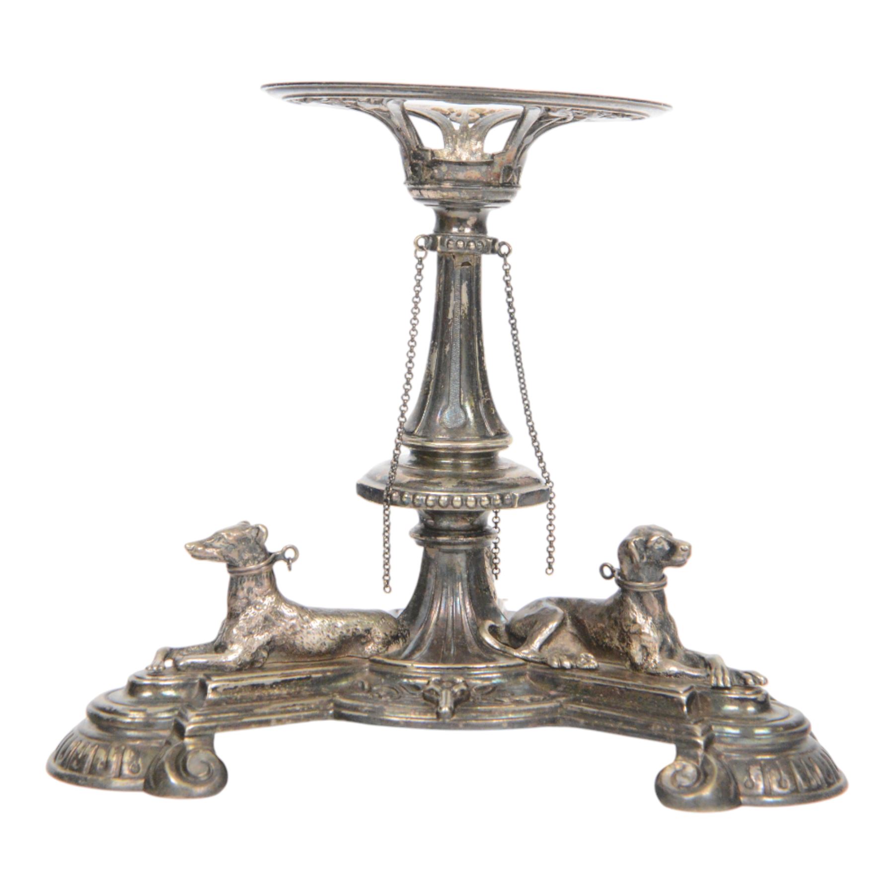 Edwardian silver plated centrepiece stand, the tripart base with applied recumbent hunting dogs interspersed with fox masks and game birds, the central knopped and tapering stem leading to a circular stand, marked 3251 beneath, H22cm  