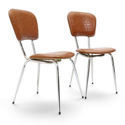 Pair of 20th century French chrome and crocodile effect bistro chairs, shaped padded back and seat upholstered in mock-croc faux leather on tapering chrome supports