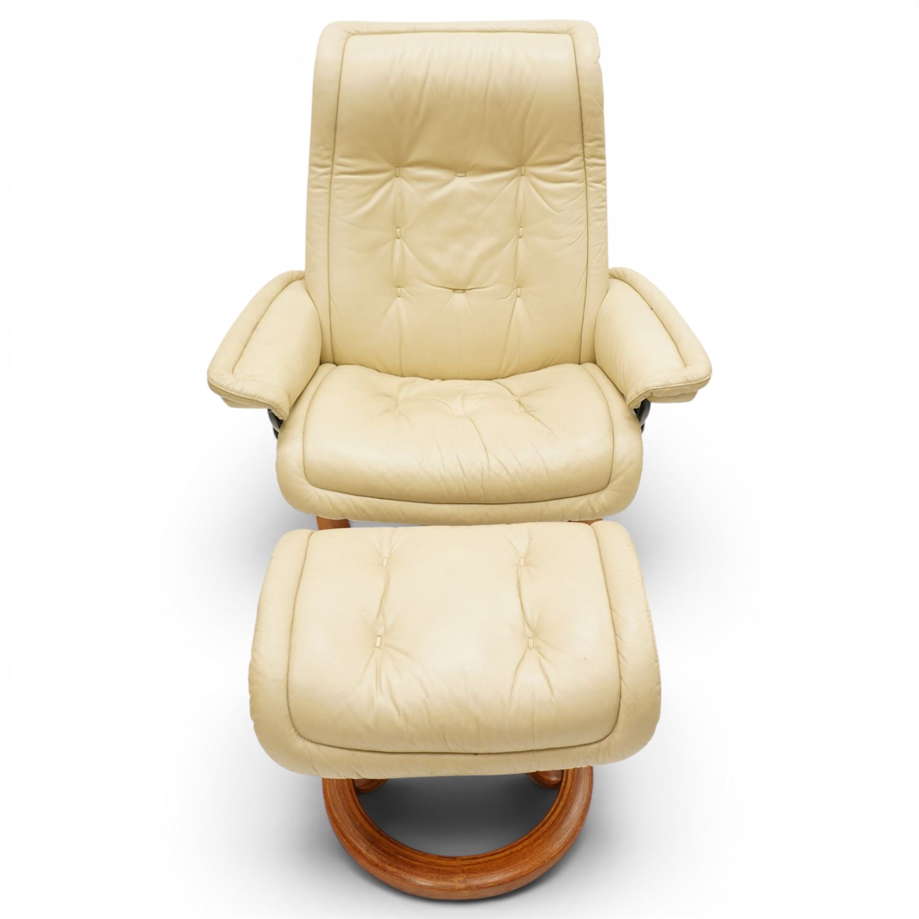Ekornes - Stressless cream leather upholstered reclining armchair together with a matching stool