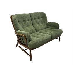 Ercol - mid-20th century three-piece suite, comprising two-seater sofa, upholstered in green fabric with teak frame, on splayed supports with stretcher (W142cm, D95cm, H87cm); with matching pair of armchairs (W82cm, D95cm, H87cm)
