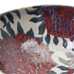 Sophie Hamilton (1963-): Sunflower bowl, decorated with blue and red sunflowers on a pale ground, unmarked, D34cm