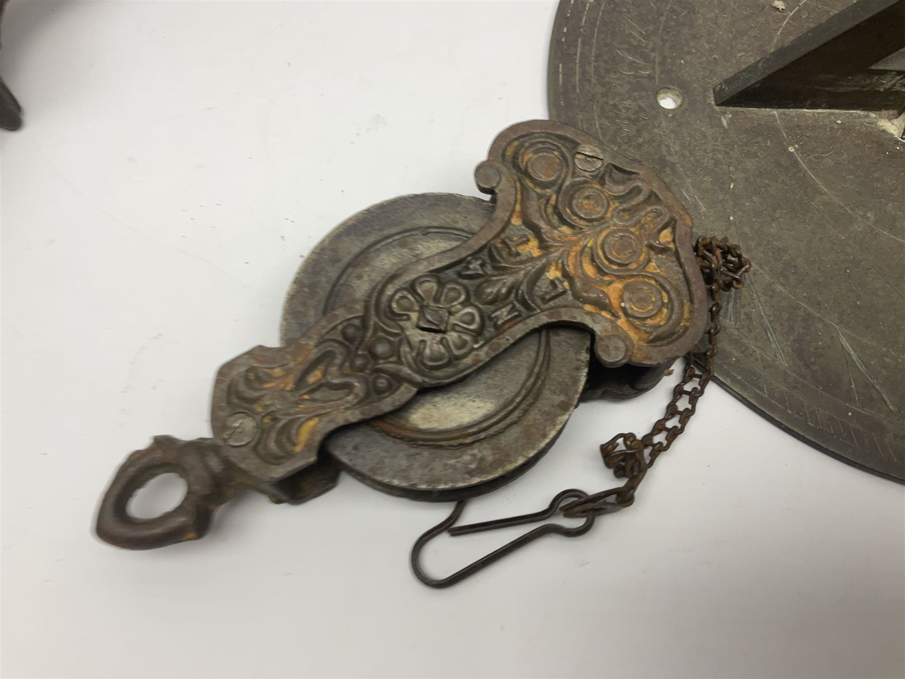 Two 19th century copper tankards, one with weighted wooden base, together with copper and wooden mechanical bellows, sundial and other metalware 