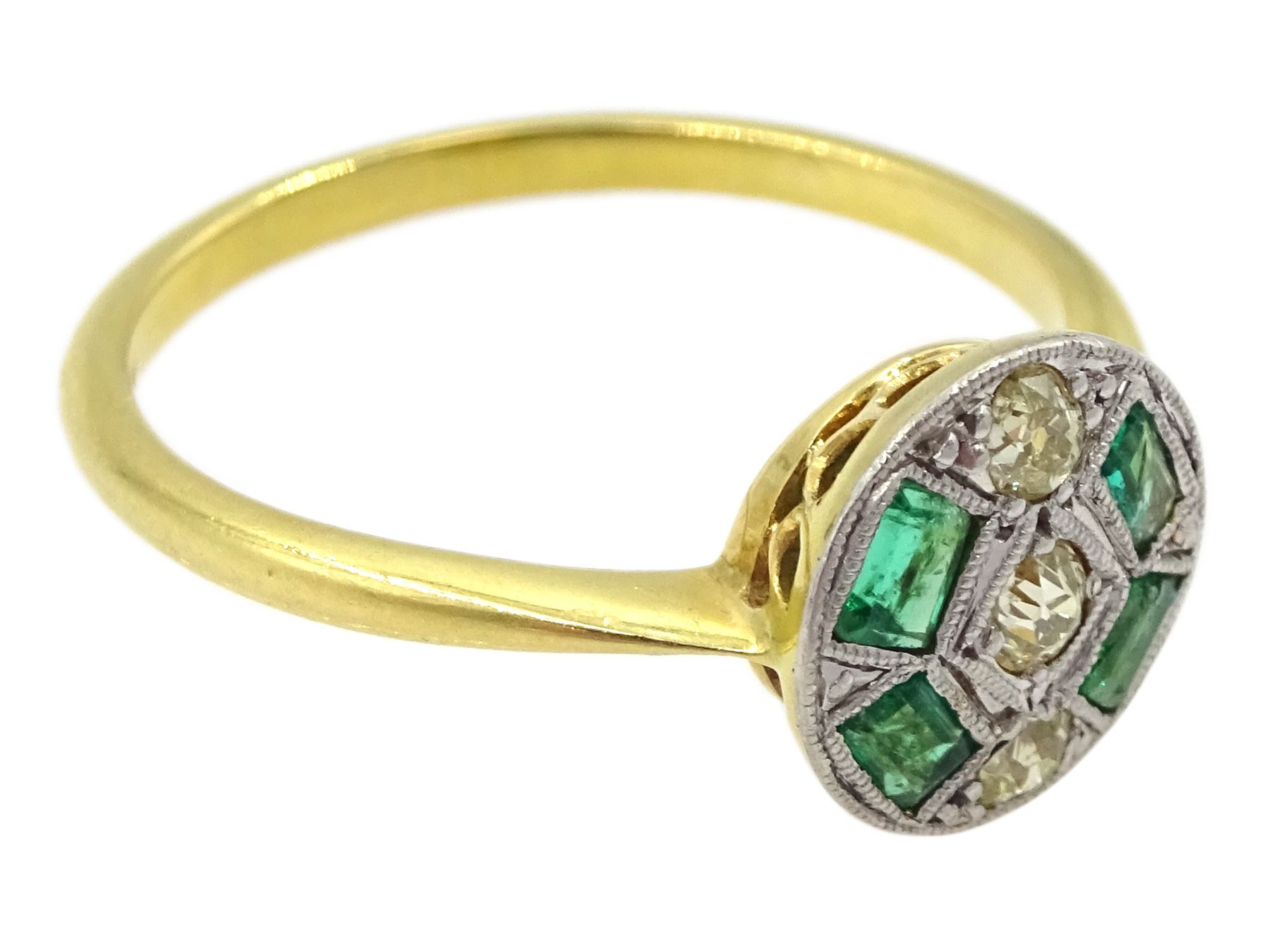 Art Deco old cut diamond and calibre cut emerald target ring, stamped 18ct & PT