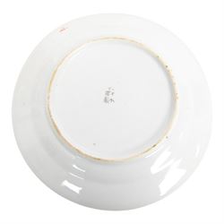 Near pair of Japanese plates, decorated in green, blue and iron-red enamels, with peacocks perched on a rock among foliage, together with Chinese cinnabar ginger jar, plates D21cm 