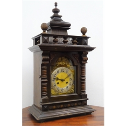  Large Edwardian stained and walnut architectural cased mantel clock with arched brass Roman dial, twin train movement half hour striking on a coil, H68cm  