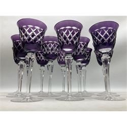 Twelve bohemian style wine glasses, the purple bell form bowls with flared rims and cut diamond pattern decoration raised upon tapering hexagonal stems and star cut base, H19cm