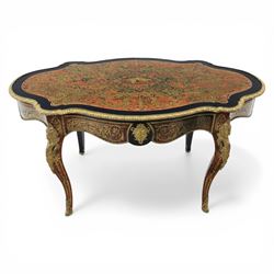 Late 19th century boulle work centre table, shaped serpentine top decorated with brass inlay on red tortoiseshell ground within ebonised border, fitted with single frieze drawer, on cabriole supports with gilt metal mounts and mask terminals