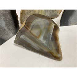 Four polished blue agate geodes, largest H10cm, L18cm