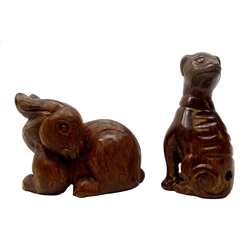  Two Japanese Meiji fruit wood Netsukes carved as a seated Dog with signature and Rabbit H5cm (2) Provenance: private collection   