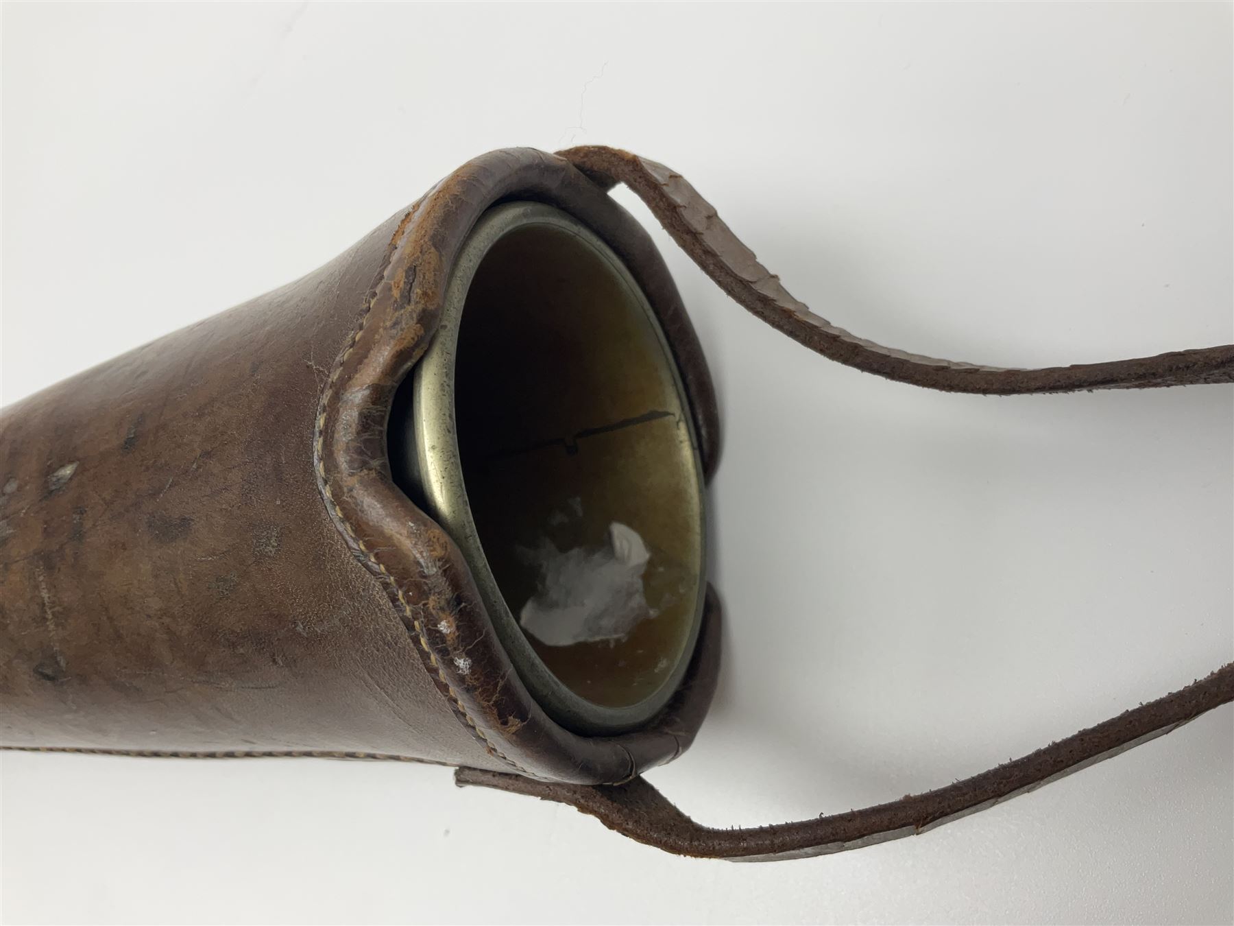 19th century telescopic hunting horn, the bell engraved 'The Beaufort', with makers mark Kohler & Son, makers, 61 Victoria Street, Westminster (from Covent garden) London, in a leather sheath, horn full extended L91cm 