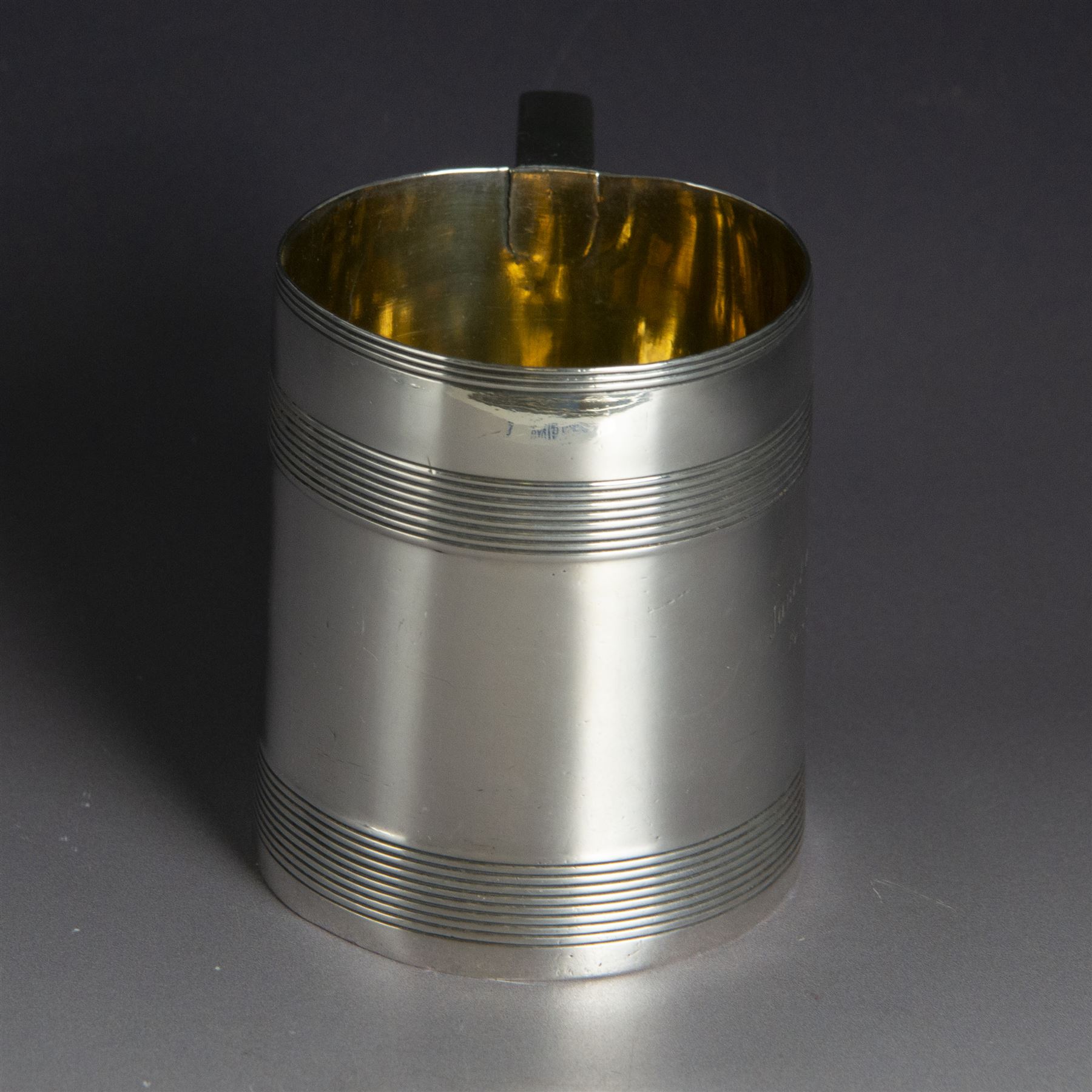George III silver christening mug, of cylindrical tapering form, with banded decoration and scroll handle, the body with later presentation engraving, hallmarked London 1799, maker's mark worn and indistinct, H8cm