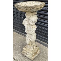 Composite stone bird bath of child holding bouquet on square base