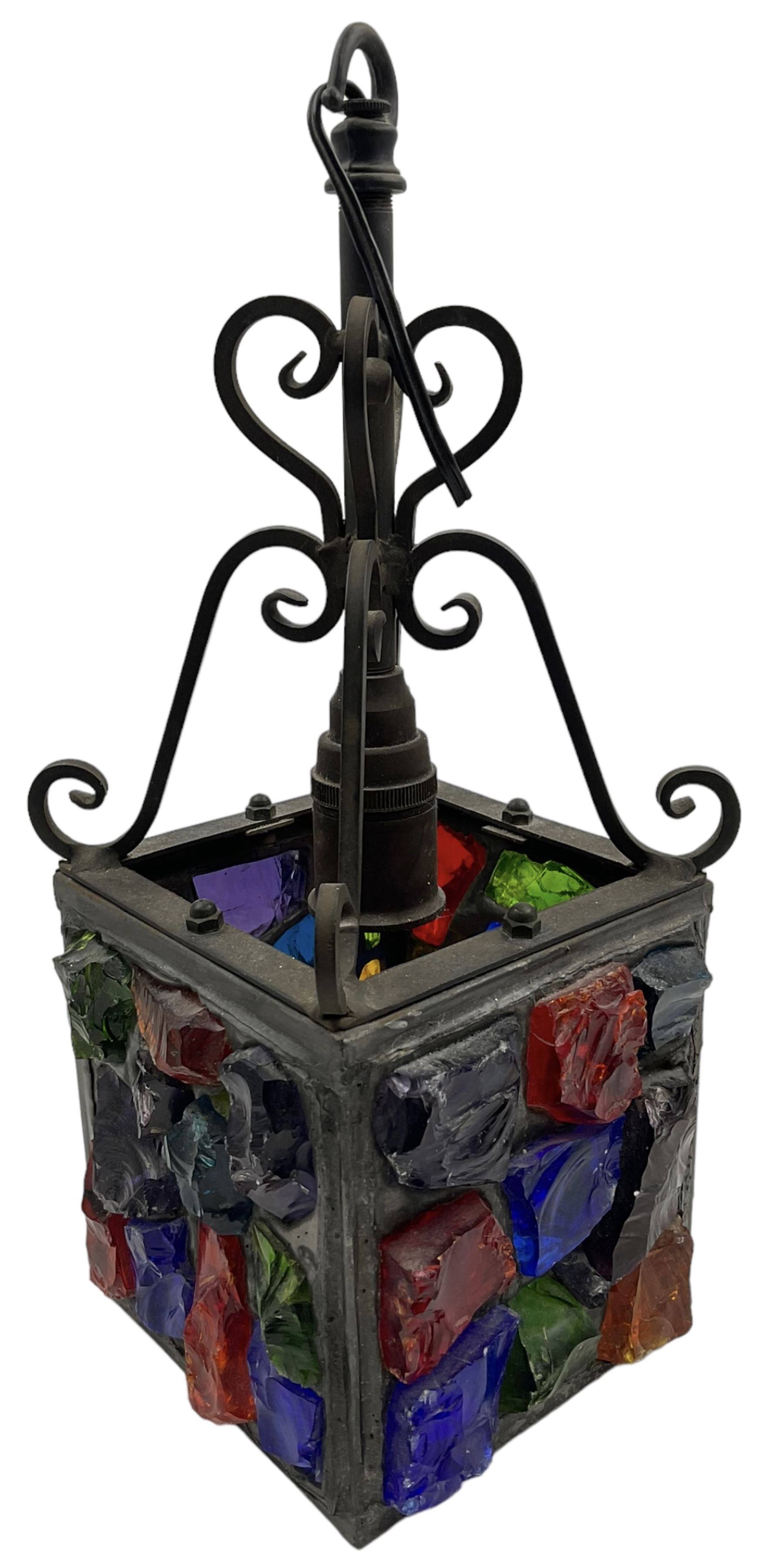 20th Century Peter Marsh Arts & Crafts wrought iron porch lantern, set with coloured panels, H36cm