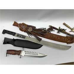 Guatemalan Collins & Co. reproduction machete with 61cm steel blade in tooled leather scabbard; modern bowie style knife, the 26cm pierced stainless steel blade with saw back and grained wooden grip in leather scabbard; and two reproduction daggers, one incorporating flintlock pistol (4)