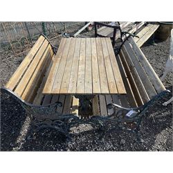 Pair of cast iron and wood slatted garden benches, with matching table - THIS LOT IS TO BE COLLECTED BY APPOINTMENT FROM DUGGLEBY STORAGE, GREAT HILL, EASTFIELD, SCARBOROUGH, YO11 3TX