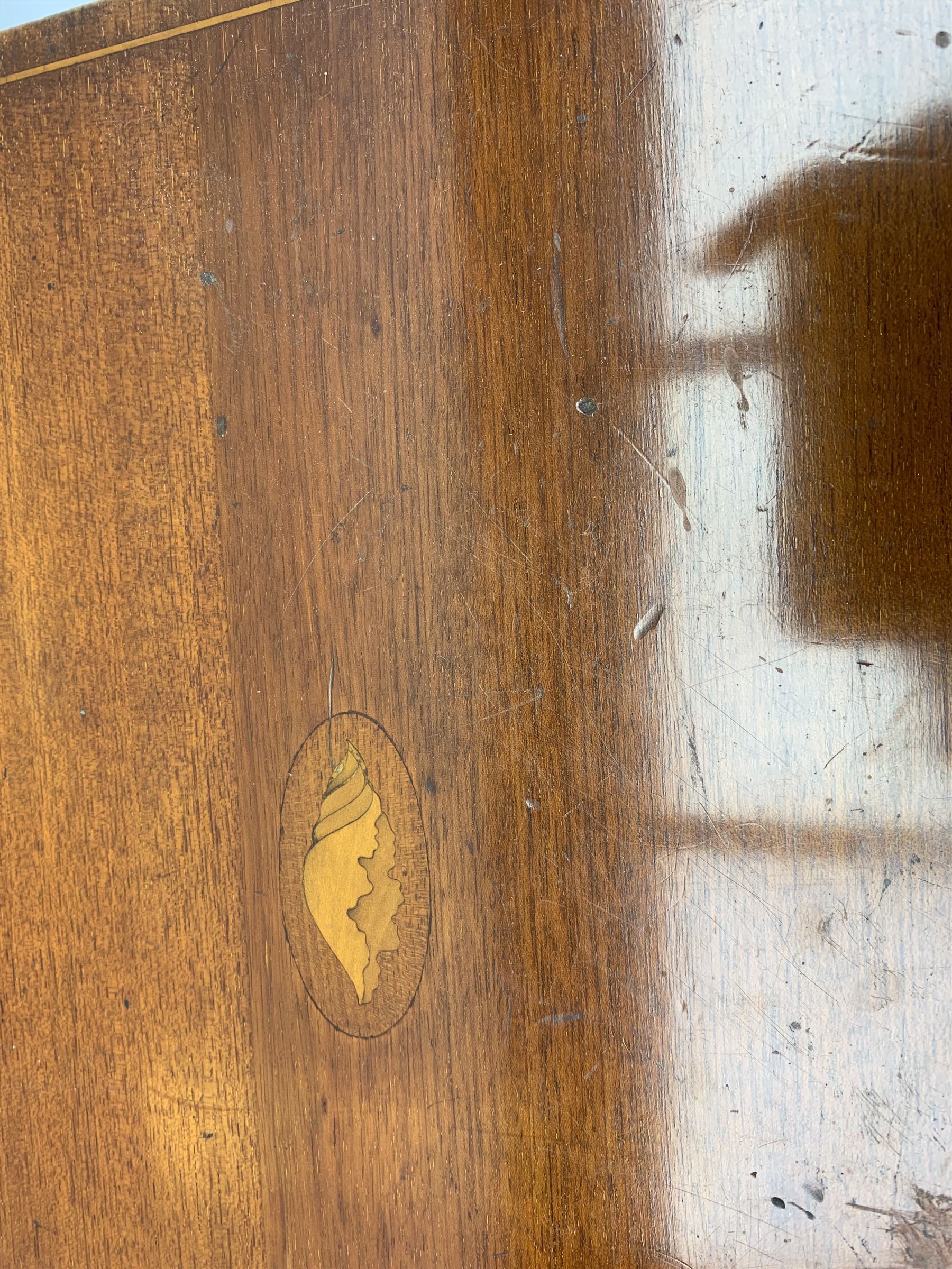 Late 19th/early 20th century composite canteen of silver flatware, contained within an early 20th century mahogany serpentine fronted case with twin drop carry handles, and hinged cover with boxwood stringing and central inlaid shell motif, above a single drawer with twin ring handles and Wellington style locking system, the cover and drawer opening to reveal plaque for Spink & Sons Ltd London, and fitted interior containing ivory handled knives, ivory handled carving set, and silver Hanoverian and Old English pattern cutlery, each with engraved monogram to terminal, hallmarked London, makers Spink & Son (John Marshall Spink), Goldsmiths & Silversmiths Co, and Chawner & Co (George William Adams), various dates ranging 1880-1923, gross weighable silver 92.59 ozt (2880 grams)