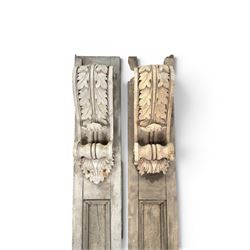Pair of 19th century pine architectural pilasters, with painted terracotta capitols, with acanthus and scroll detail (18cm x 15cm x 57cm)