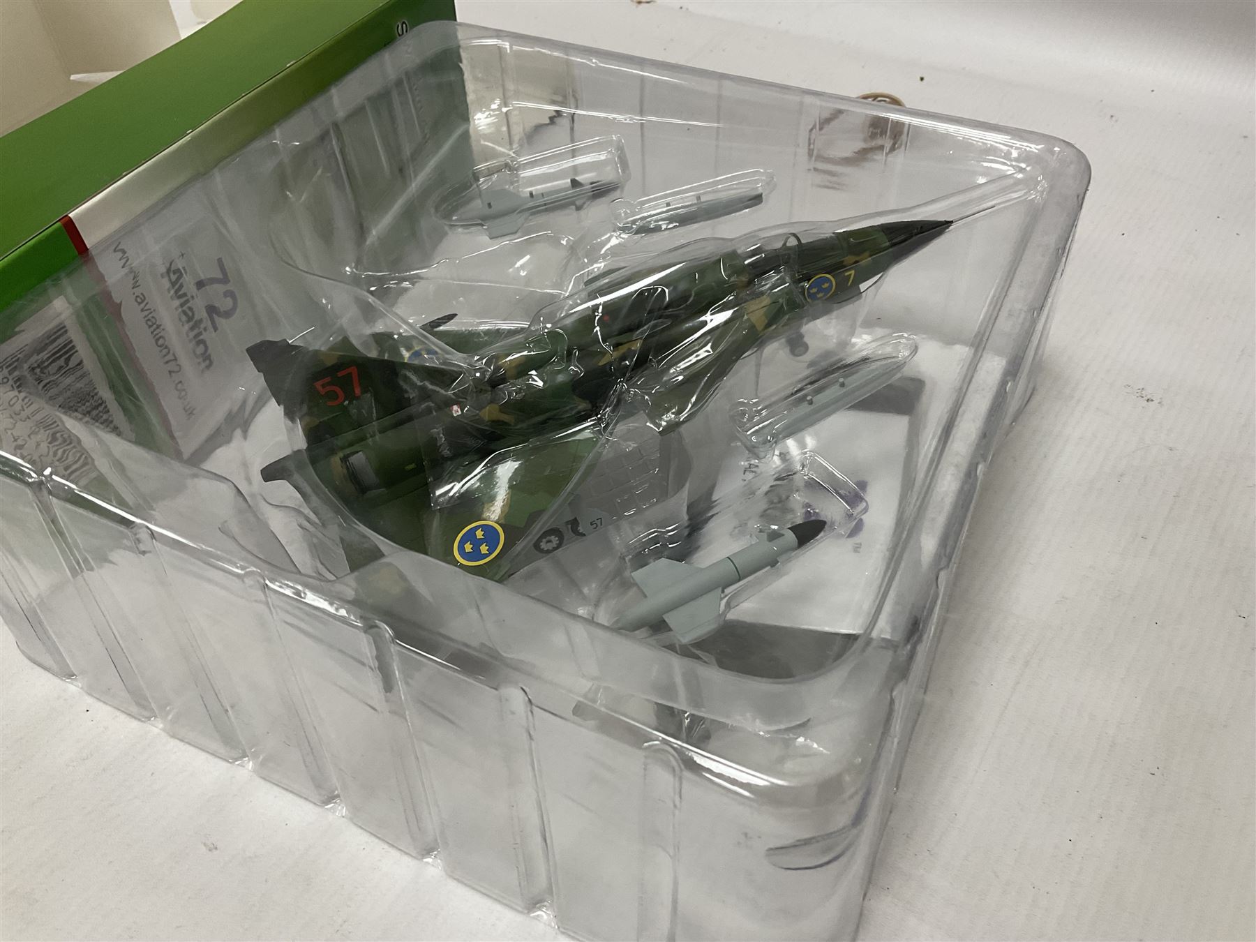 Four 1:72 scale model airplanes comprising two Aviation 72 models AV7242001 Sweden Air Force Saab AJ37 Viggen SAF 57-7 and AV7252001 Fairey Gannet; and two HobbyMaster models HA01001 and HA2101; all in original boxes