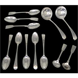 Group of silver spoons, comprising three Victorian Fiddle pattern teaspoons, hallmarked Henry Holland, London 1853, pair of George IV Fiddle pattern salt spoons, hallmarked George Ferris, Exeter 1826, pair of mid 20th century sauce ladles, hallmarked Cooper Brothers & Sons Ltd, Sheffield 1964, and five Georgian Old English pattern teaspoons with bright cut engraving, approximate total silver weight 6.94 ozt (216 grams)