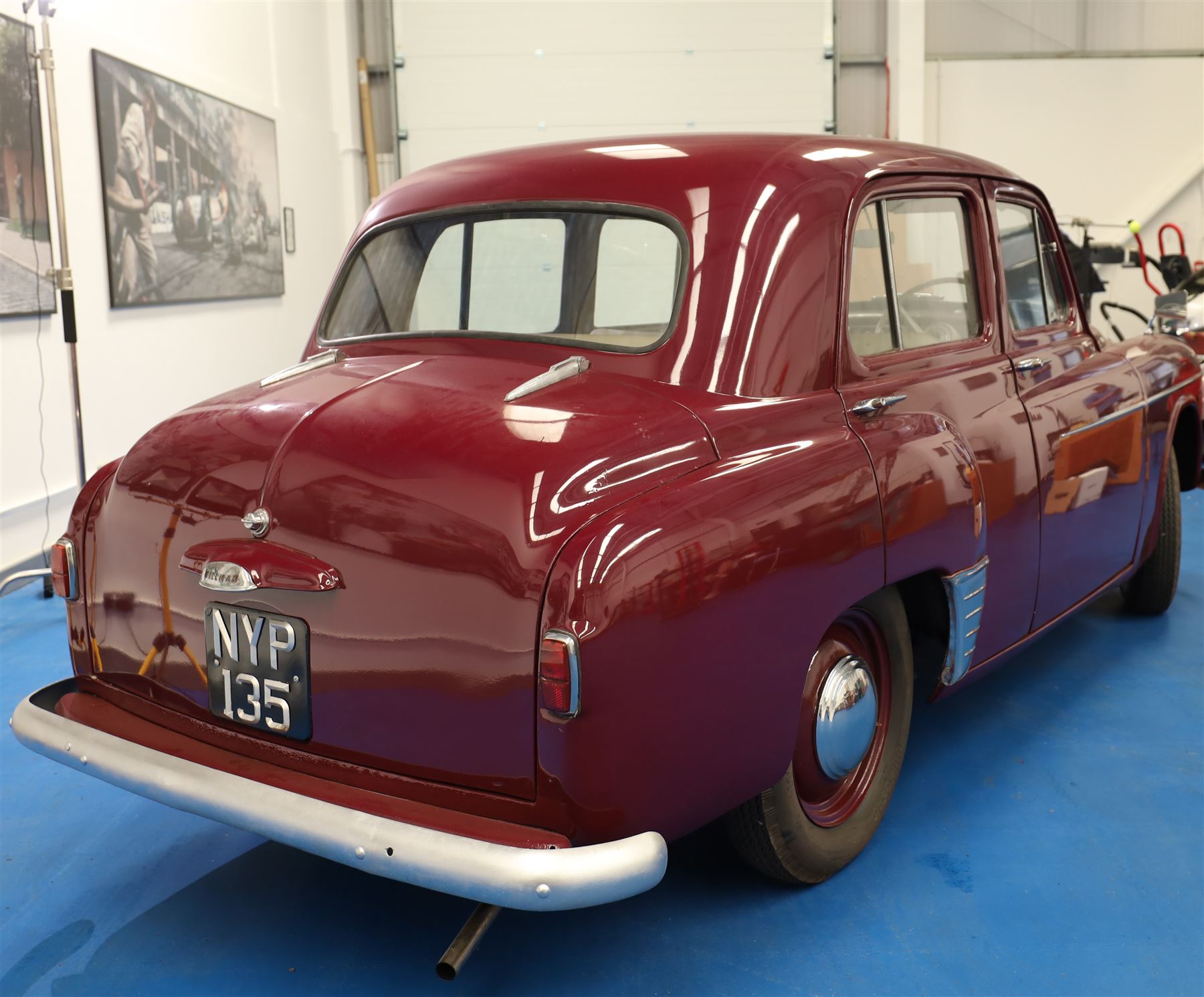 1953 Hillman Minx Saloon

Registration: NYP 135
Engine: 1,265cc petrol
Transmission: Manual, column change
Odometer reading: 37,553 miles
Colour: Maroon red
Interior: Cream
Former keepers: 3
V5C: Present
Keys: One

A 1953 Hillman Minx four-door saloon, finished in maroon red with a contrasting cream interior.

Powered by a 1,265cc petrol engine with manual column-change transmission. The Smiths speedometer displays 37,553 miles, although this mileage has not been independently verified.

The vehicle has previously been restored and presents with glossy maroon paintwork, cream bench seating and a period dashboard and steering wheel. The engine bay is painted to match the exterior and appears generally tidy. The underside has been coated or undersealed in places, with the chassis, floor sections, suspension and exhaust visible in the accompanying photographs.

At the time of cataloguing, the engine turned over but did not start.

Features

• 1,265cc petrol engine
• Manual column-change transmission
• Right-hand drive
• Four-door saloon body
• Maroon red exterior
• Cream bench-seat interior
• Smiths instrumentation
• Period dashboard controls
• Steel wheels with chrome hubcaps
• Chrome bumpers and exterior trim
• Rear-hinged bonnet
• Leaf-spring suspension

History and Documentation

• V5C registration document present
• Three former keepers recorded
• One key
• Pitman’s handbook included

Condition

The vehicle is presented in restored condition. The maroon paintwork retains a good overall gloss, with some age-related marks and imperfections visible on closer inspection.

The cream interior presents well overall, with signs of age and use to the upholstery, carpets, dashboard and controls. Some surface deterioration and pitting are visible to areas of the chrome and brightwork.

The engine bay appears tidy, although some wiring and ancillary components appear non-original or subsequently renewed. The underside has received protective coating or underseal in areas. Prospective purchasers should inspect the structure, chassis, floor, suspension and mechanical components carefully.

At the time of cataloguing, the engine turned over but did not start. The vehicle has not been mechanically inspected or road tested by the auctioneers.

Prospective purchasers should satisfy themselves as to the vehicle’s condition, specification, originality, mileage, identity and roadworthiness before bidding.

This vehicle forms part of the Estate of the Late John Sills and is offered for sale by the Executors, confirming a genuine reason for sale.