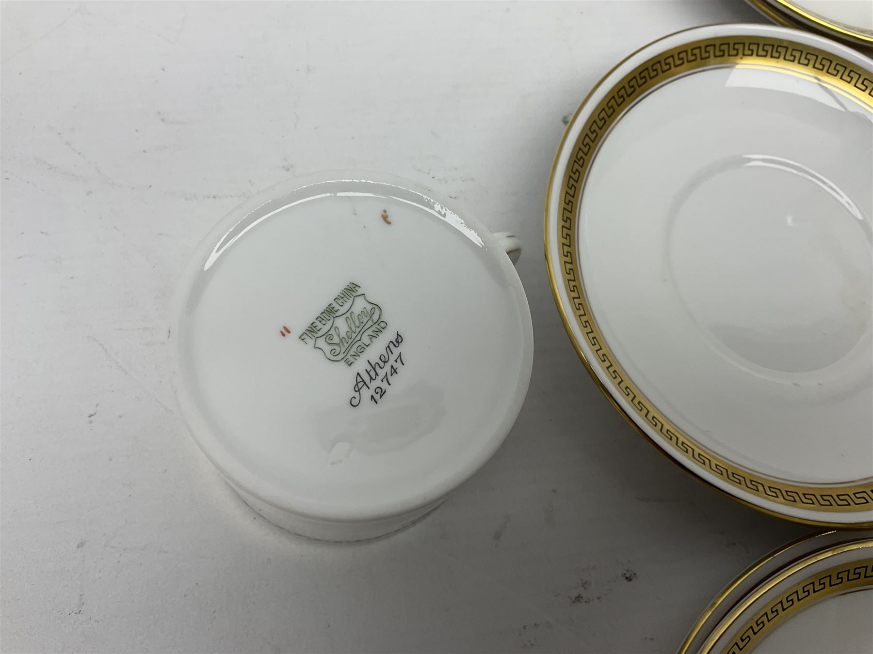 Six Shelley Athens pattern coffee cups and saucers, together with six Coalport Revelry coffee cups and saucers, and a Wedgwood tea set for two people