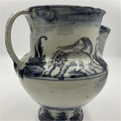 Tin glazed earthenware wet drug jug, decorated with cherubs in a landscape, H90cm 
