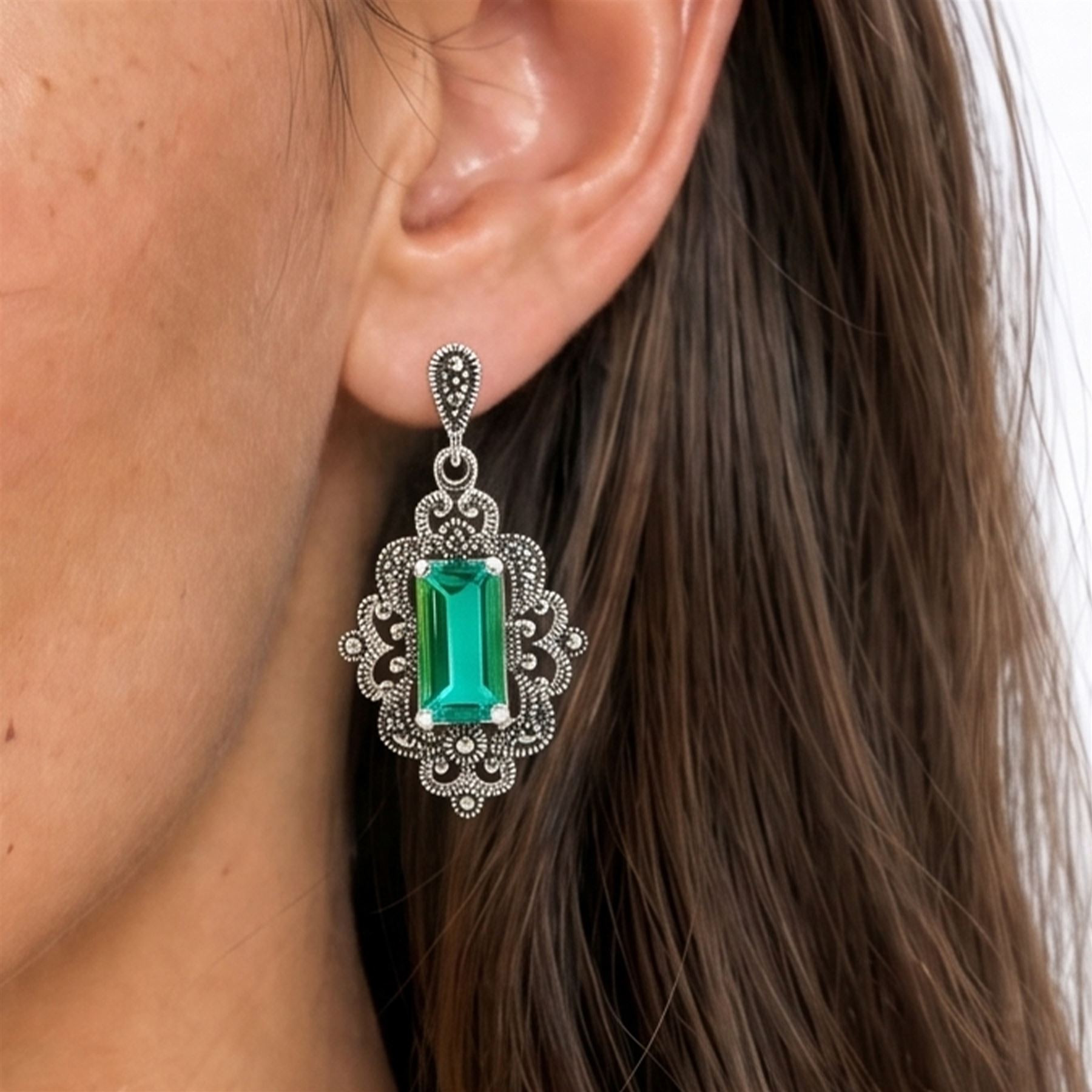 Pair of silver marcasite and green quartz pendant stud earrings
