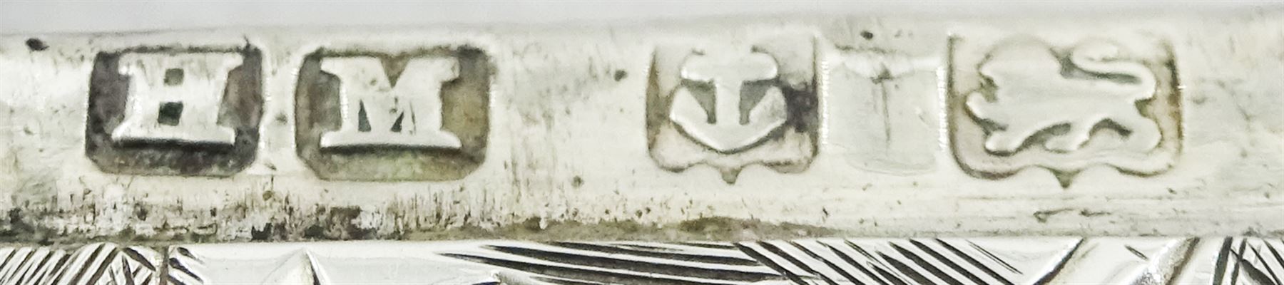 Edwardian silver card case, of curved oblong form, engraved with vacant cartouche surrounded by foliate scrolls, hallmarked Henry Matthews, Birmingham 1905, W8.5cm, together with an Edwardian silver vesta case, of rounded rectangular form, engraved with vacant circular panel surrounded by foliate scrolls, hallmarked William Neale, Chester 1901, approximate total weight 1.66 ozt (51.8 grams)