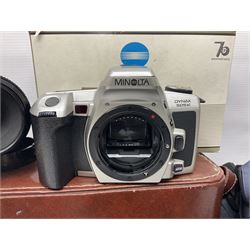 Four Minolta camera bodies, to include Dynax 500si, serial no. 94812651 with 'Signa Zoom 1;3.5-4.5 f=28-70mm' lens, Maxxum 300si, serial no. 97821665, with 'Tamron AF 80-210mm' lens and Dynax 300si, serial no 01603265'  with Minolta AF Power Zoom 35-80mm 1;4' lens, etc, together with Pantax MV1 camera bodies and other camera equipment 