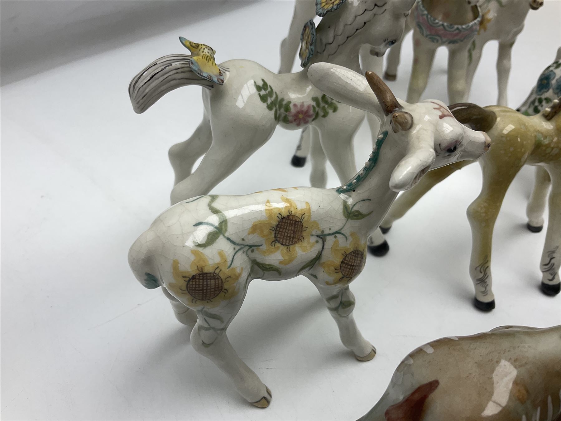 Basil Matthews figures, comprising horses, deer and fawns, all with painted mark beneath, largest H14cm